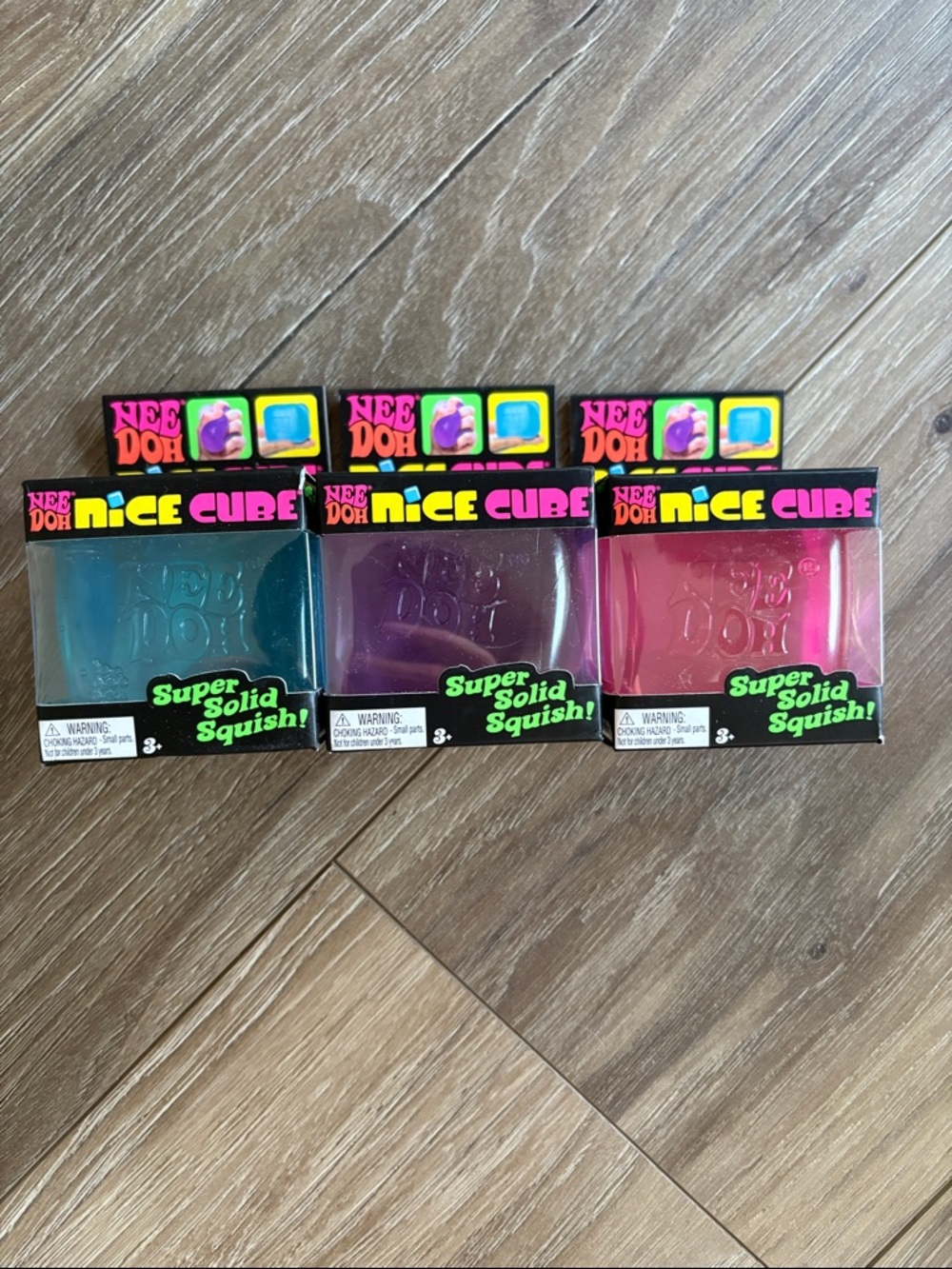 NeeDoh Nice Cube 3 pack - Super Solid Squish Trio - Teal, Purple, Pink